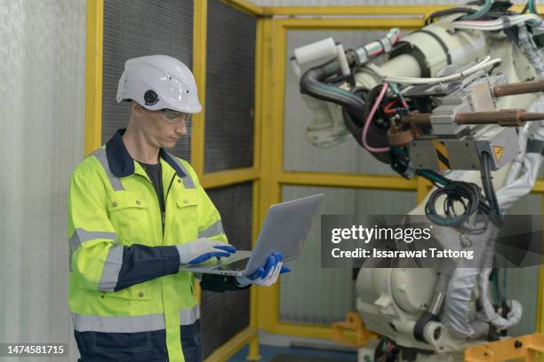 smart industry robot arms modernization for digital factory technology . concept of automation manufacturing process of industry 4.0 or 4th industrial revolution and iot software control operation . - 4th industrial revolution stock pictures, royalty-free photos & images