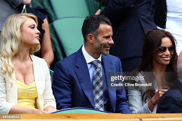 Singer Camilla Kerslake, football player Ryan Giggs and his wife Stacey Cooke attend the Ladies' Singles third round match Serena Williams of the USA...