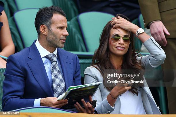 Football player Ryan Giggs and his wife Stacey Cooke attend the Ladies' Singles third round match Serena Williams of the USA and Jie Zheng of China...