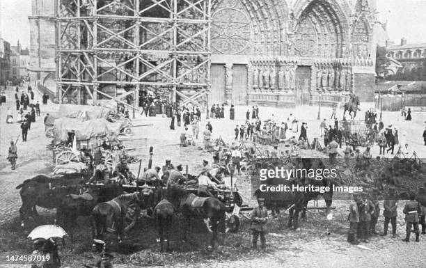 ''La Courte Occupation de Reims; Reims le cathedrale', 1914. From "L'Album de la Guerre 1914-1919: Volume I". [L'Illustration, Paris, 1926]. Creator:...