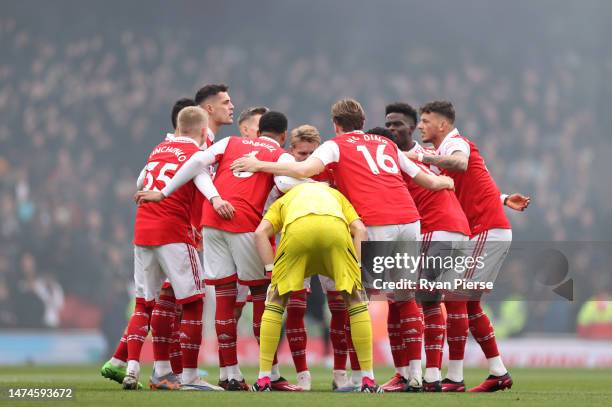 Players of Arsenal huddle prior to the Premier League match between Arsenal FC and Crystal Palace at Emirates Stadium on March 19, 2023 in London,...