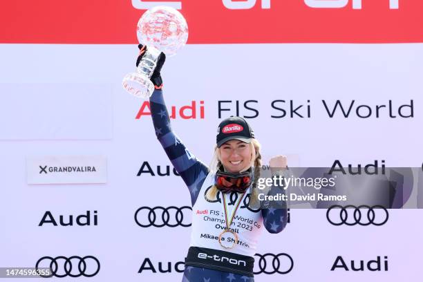 Overall Cup Champion Mikaela Shiffrin of United States poses for a photo with the Overall World Cup Crystal Globe trophy during the victory ceremony...