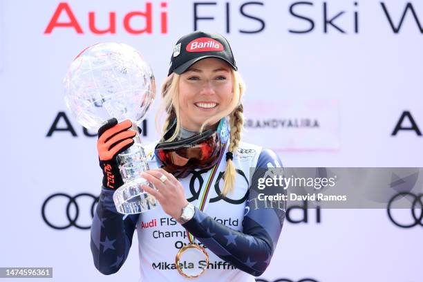 Overall Cup Champion Mikaela Shiffrin of United States poses for a photo with the Overall World Cup Crystal Globe trophy during the victory ceremony...