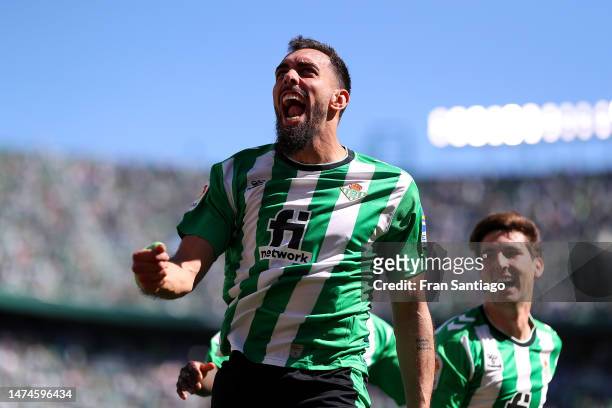 Borja Iglesias of Real Betis celebrates after scoring the team's first goal during the LaLiga Santander match between Real Betis and RCD Mallorca at...