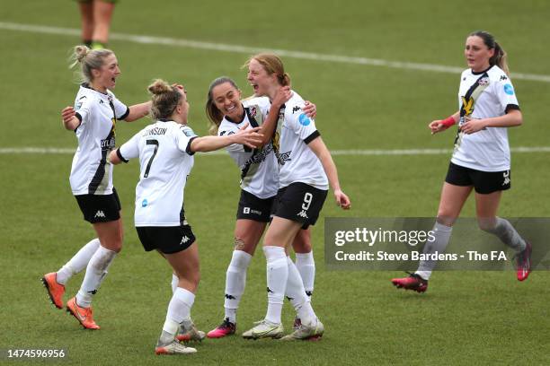 Emily Kraft of Lewes celebrates with teammates after scoring the team's first goal during the Vitality Women's FA Cup match between Lewes and...