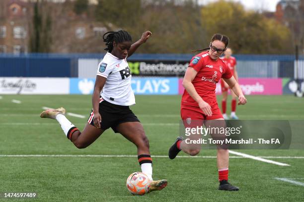 Freda Ayisi of Charlton Athletic crosses the ball whilst under pressure from Katy Morris of Coventry United during the Barclays FA Women's...