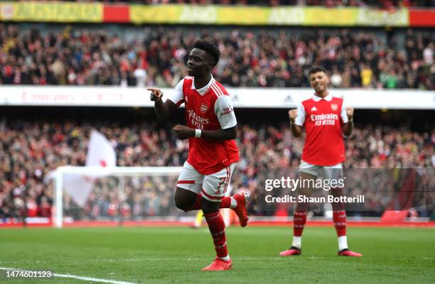 Bukayo Saka of Arsenal celebrates after scoring the team's second goal during the Premier League match between Arsenal FC and Crystal Palace at...