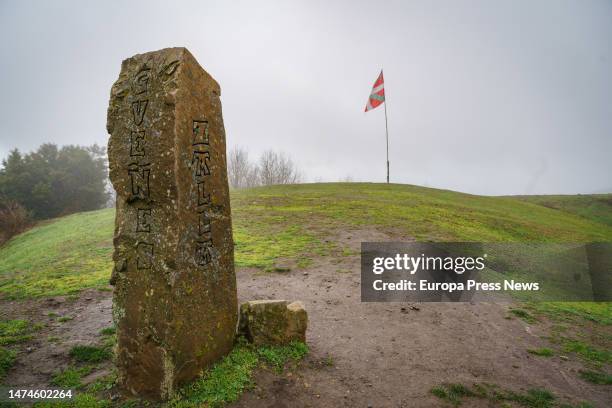 An Ikurriña on Mount Ilso Eguen where a wind farm with six wind turbines is planned, on March 19 in Biscay, Basque Country, Spain. The electric...