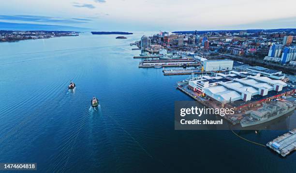 pair of tugboats - halifax harbour stock pictures, royalty-free photos & images