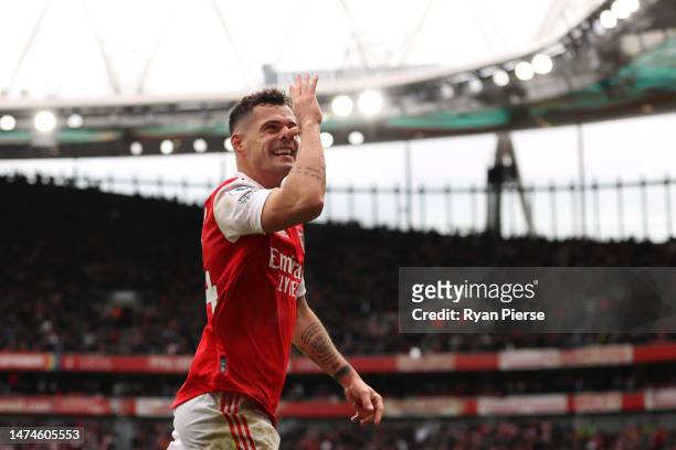 Granit Xhaka of Arsenal celebrates after scoring the team's third goal during the Premier League match between Arsenal FC and Crystal Palace at...