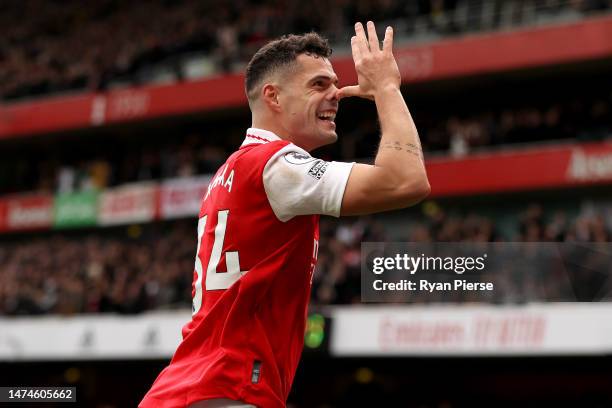 Granit Xhaka of Arsenal celebrates after scoring the team's third goal during the Premier League match between Arsenal FC and Crystal Palace at...