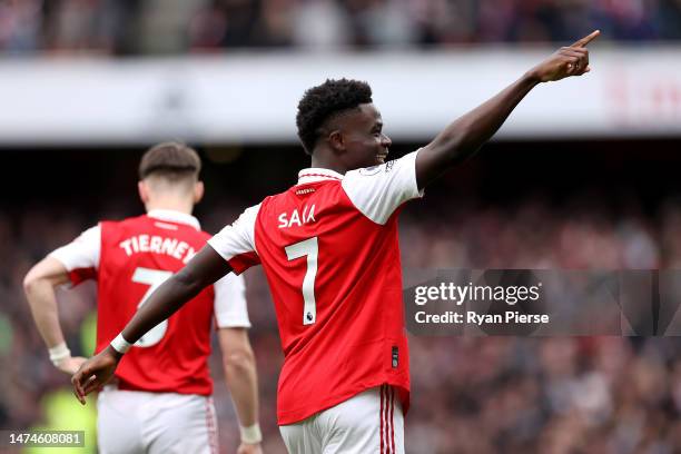 Bukayo Saka of Arsenal celebrates after scoring the team's fourth goal during the Premier League match between Arsenal FC and Crystal Palace at...