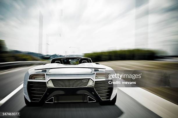 sports car on highway - audi car stock pictures, royalty-free photos & images