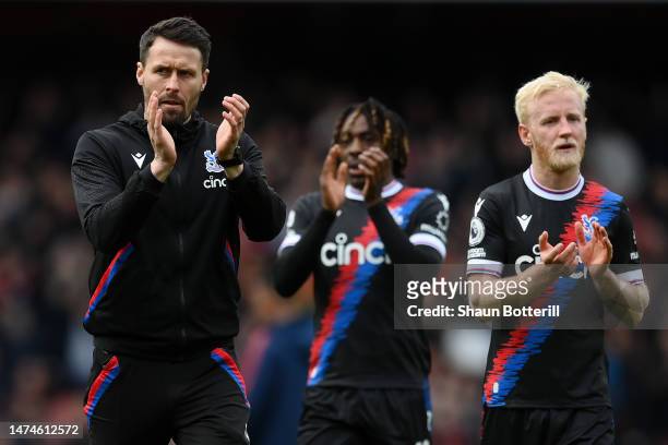Paddy McCarthy, Interim Manager of Crystal Palace, applauds their fans after their side's defeat during the Premier League match between Arsenal FC...
