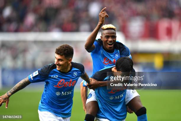 Victor Osimhen of SSC Napoli celebrates with Kim Min-Jae and Giovanni Di Lorenzo of SSC Napoli following their win during the Serie A match between...