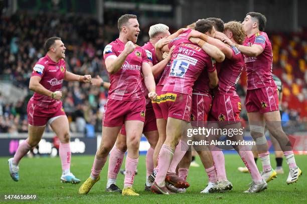 Rory O'Loughlin of Exeter Chiefs celebrates as players of Exeter Chiefs celebrate after defeating London Irish during the Premiership Rugby Cup match...