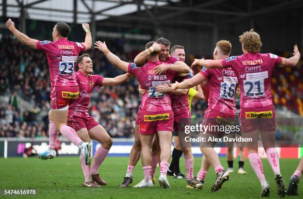 Players of Exeter Chiefs celebrate after defeating London Irish during the Premiership Rugby Cup match between London Irish and Exeter Chiefs at...