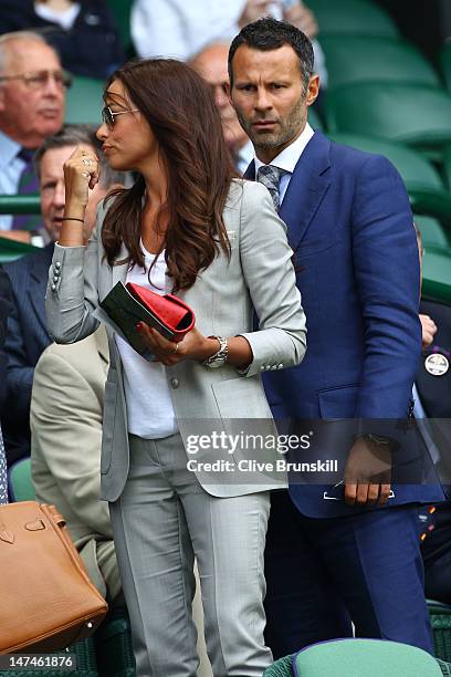 Football player Ryan Giggs and his wife Stacey Cooke attend the Ladies' Singles third round match Serena Williams of the USA and Jie Zheng of China...