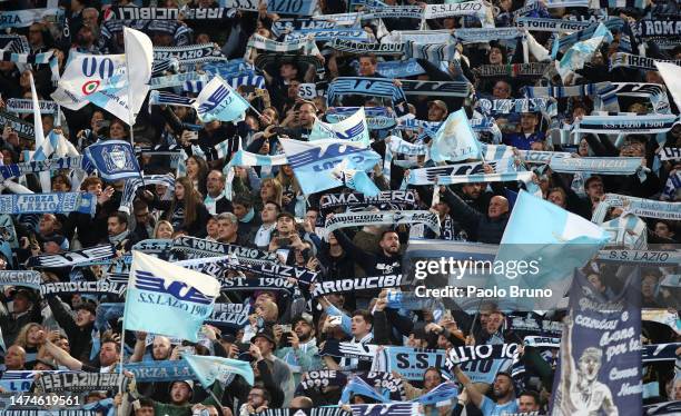 General view of SS Lazio fans holding scarves to show support prior to the Serie A match between SS Lazio and AS Roma at Stadio Olimpico on March 19,...