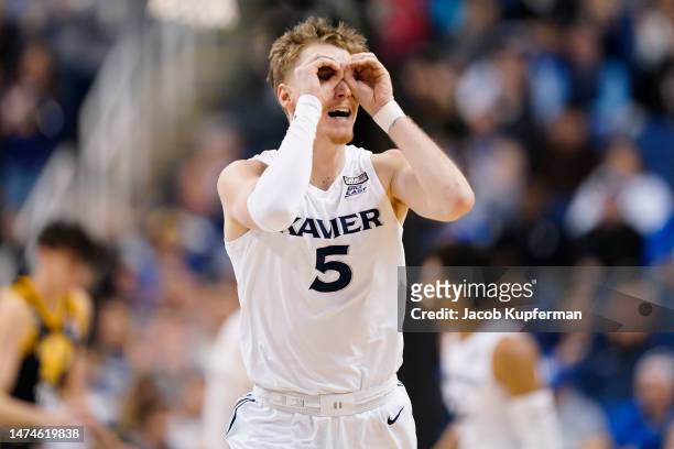 Adam Kunkel of the Xavier Musketeers reacts during the first half against the Pittsburgh Panthers in the second round of the NCAA Men's Basketball...