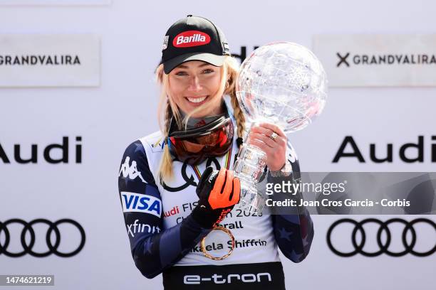 Mikaela Shiffrin of the United States celebrates her Overall victory with the Overall Crystal Globe during the Audi FIS Alpine Ski World Cup Finals -...