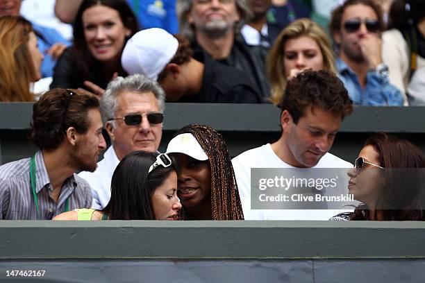 Tennis player Venus Williams , Actor Dustin Hoffman and tennis player Justin Gimelstob attend the Ladies' Singles third round match Serena Williams...