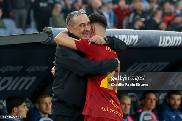 Maurizio Sarri, Head Coach of SS Lazio and Paulo Dybala of AS Roma interact prior to the Serie A match between SS Lazio and AS Roma at Stadio...