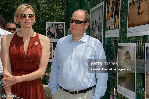 Prince Albert II of Monaco and Princess Charlene attend the annual Monaco Red Cross Pique-Nique at Jardins Princesse Antoinette on June 30, 2012 in...