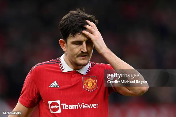 Harry Maguire of Manchester United looks dejected during the Emirates FA Cup Quarter Final match between Manchester United and Fulham at Old Trafford...