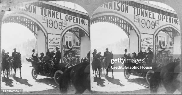 Stereoscopic image showing American politician William Howard Taft, President of the United States, waving from his car as he attends the opening of...