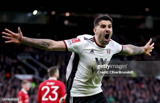 Aleksandar Mitrovic of Fulham celebrates after scoring the team's first goal during the Emirates FA Cup Quarter Final match between Manchester United...