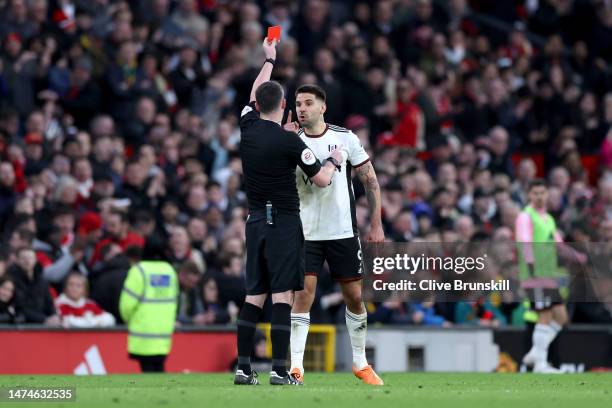 Aleksandar Mitrovic of Fulham receives a red card from Referee Chris Kavanagh during the Emirates FA Cup Quarter Final match between Manchester...