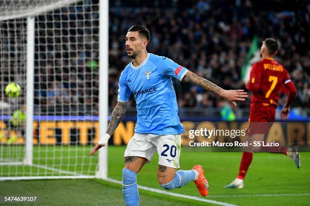 Mattia Zaccagni of SS Lazio celebrates after scoring the opening goal during the Serie A match between SS Lazio and AS Roma at Stadio Olimpico on...