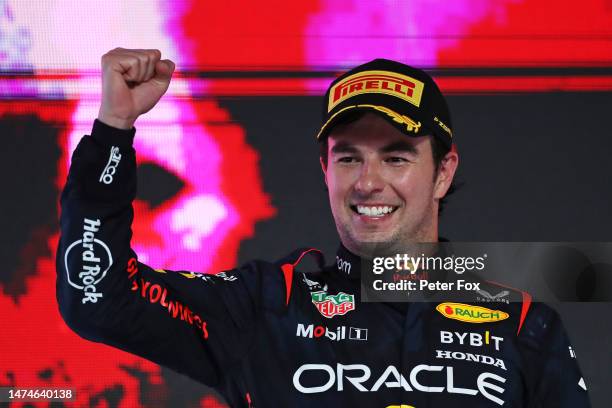 Race winner Sergio Perez of Mexico and Oracle Red Bull Racing celebrates on the podium during the F1 Grand Prix of Saudi Arabia at Jeddah Corniche...