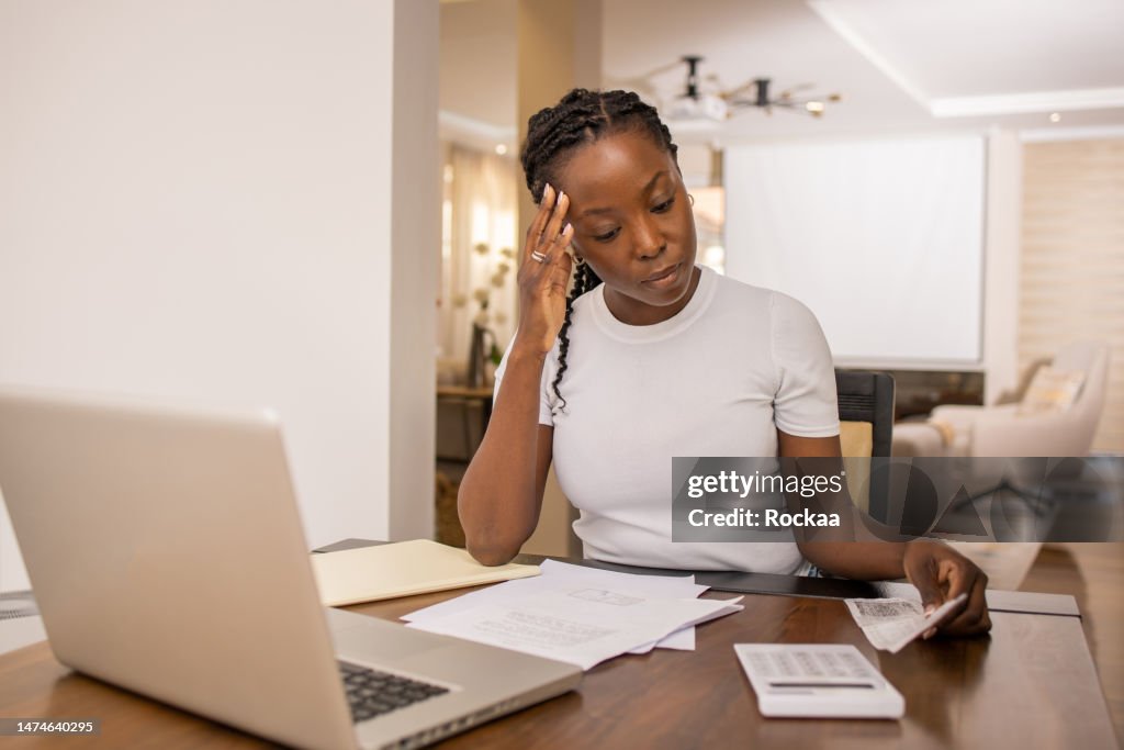 Success Through Paperwork Young Woman Going Through Paperwork High-Res Stock Photo - Getty Images
