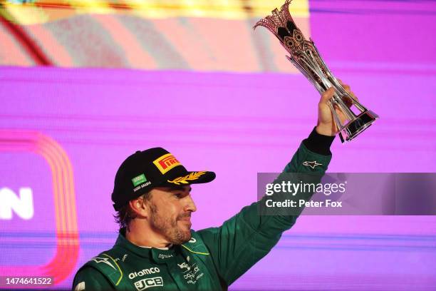 Third placed Fernando Alonso of Spain and Aston Martin F1 Team celebrates on the podium during the F1 Grand Prix of Saudi Arabia at Jeddah Corniche...