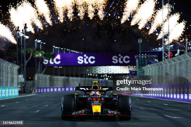 Race winner Sergio Perez of Mexico driving the Oracle Red Bull Racing RB19 stops in parc ferme during the F1 Grand Prix of Saudi Arabia at Jeddah...