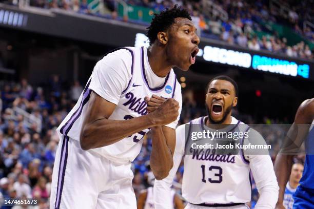 Nae'Qwan Tomlin and Desi Sills of the Kansas State Wildcats react during the first half against the Kentucky Wildcats in the second round of the NCAA...