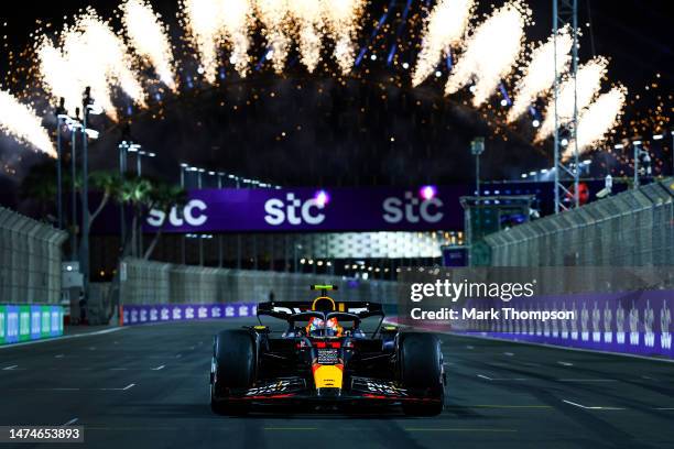 Race winner Sergio Perez of Mexico driving the Oracle Red Bull Racing RB19 stops in parc ferme during the F1 Grand Prix of Saudi Arabia at Jeddah...