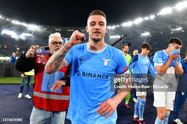 Sergej Milinkovic Savic of SS Lazio celebrates a victory after the Serie A match between SS Lazio and AS Roma at Stadio Olimpico on March 19, 2023 in...