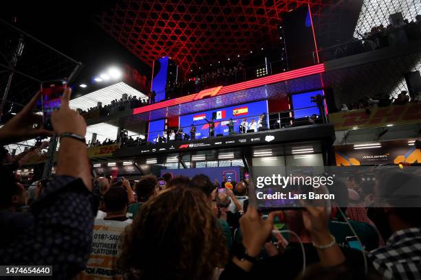 General view of the podium celebrations with Race winner Sergio Perez of Mexico and Oracle Red Bull Racing, Second placed Max Verstappen of the...