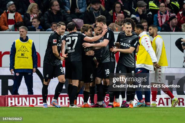 Ritsu Doan of Freiburg celebrates after scoring his team's first goal during the Bundesliga match between 1. FSV Mainz 05 and Sport-Club Freiburg at...