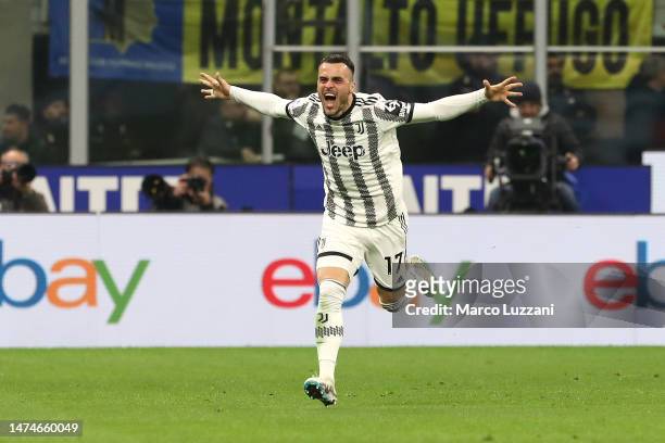 Filip Kostic of Juventus celebrates after scoring the team's first goal during the Serie A match between FC Internazionale and Juventus at Stadio...