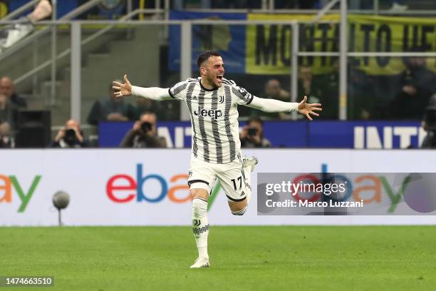 Filip Kostic of Juventus celebrates after scoring the team's first goal during the Serie A match between FC Internazionale and Juventus at Stadio...