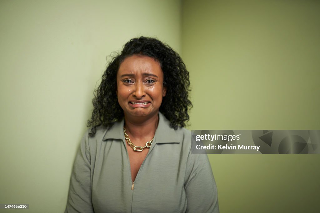 Portrait of grieving woman crying