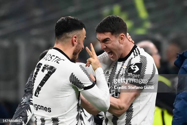 Filip Kostic of Juventus FC and Dusan Vlahovic of Juventus FC celebrates a goal during the Serie A match between FC Internazionale and Juventus at...