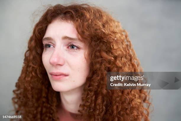 portrait of crying heart broken young woman - tears crying stock pictures, royalty-free photos & images