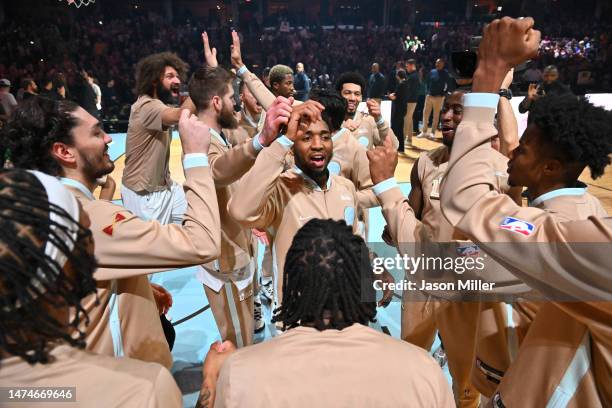 Donovan Mitchell of the Cleveland Cavaliers leads the team in the huddle during player introductions prior to the game against the Washington Wizards...