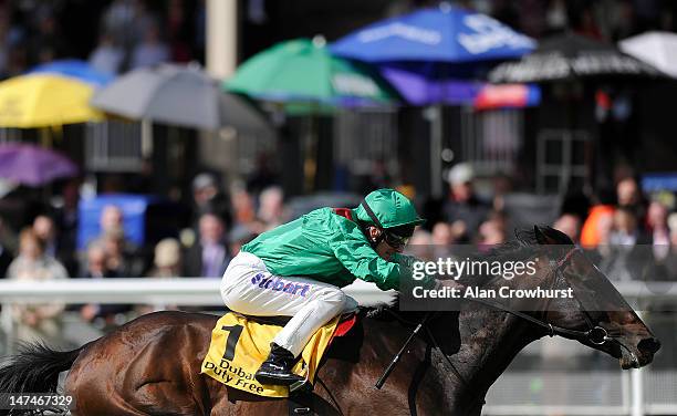 Johnny Murtagh riding Sharestan win The Dubai Duty Free Tennis Championship Celebration Stakes at Curragh racecourse on June 30, 2012 in Kildare,...