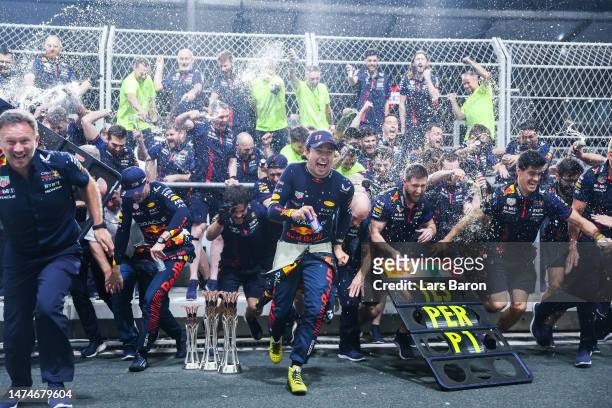 Race winner Sergio Perez of Mexico and Oracle Red Bull Racing, Second placed Max Verstappen of the Netherlands and Oracle Red Bull Racing and the Red...